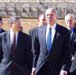 Sec. of State Powell, accompanied by the Chairman of the Yad Vashem Directorate Avner Shalev, (left) arrives at Yad Vashem. American Ambassador to Israel, Martin Indyk, far right