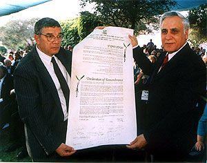 President of Israel, Moshe Katsav (right) displaying the Declaration of Remembrance with Avner Shalev, Chairman of the Yad Vashem Directorate 17.9.2003