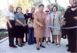 Delegation members of the American Society cut the ribbon at the dedication ceremony for the Commemorators&#039; Path