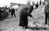 Father Beccari planting a tree at Yad Vashem 