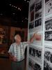 Daniel Lerner, near a photograph of his father, Baruch (Boria) Lerner, in the Holocaust History Museum at Yad Vashem