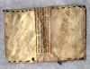A wallet made from the parchment of a Torah scroll