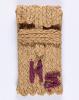 Raffia glasses case that Irma Schwartz made in the Gurs detainment camp, and sent to her son Heinz in Switzerland on the occasion of his Bar Mitzvah