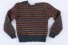 סוודר שלקח הילד אנדרש בריכטה ממחסן הבגדים באושוויץ בירקנאו לאחר בריחת הגרמנים מהמחנה