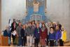 KC Carlsen (front row, second from right), our travel agent for tours (including the Prayer and Study Tour May 2017) and her group pictured with Dr. Susanna Kokkonen (front row, third from right) in front of the Ark in the synagogue at Yad Vashem 
