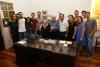 Shlomo Margulies and extended family visit the piano he donated to Yad Vashem's Holocaust History Museum. 