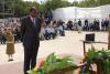 Dean of the Diplomatic Corps Henri Etoundi Essomba lays a wreath during the ceremony
