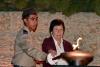 Holocaust survivor Fanny Ben-Ami lights one of the six torches at the ceremony
