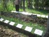 Las nuevas señales de tumbas y las antiguas que posteriormente fueron donadas a Yad Vashem, el cementerio judío de Djakovo, 2011