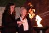Holocaust survivor Mirjam Lapid lights one of the six torches at the ceremony