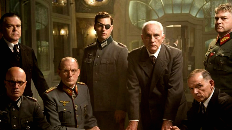 The Conspirators (standing, left to right): Kevin McNally as Carl Goerdeler; Tom Cruise as Colonel Claus von Stauffenberg; Terence Stamp as General Ludwig Beck; Kenneth Branagh as Major-General Henning von Tresckow. (Sitting, L to R:) Christian Berkel as 