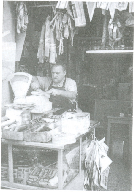 Chaim Raphael in his store