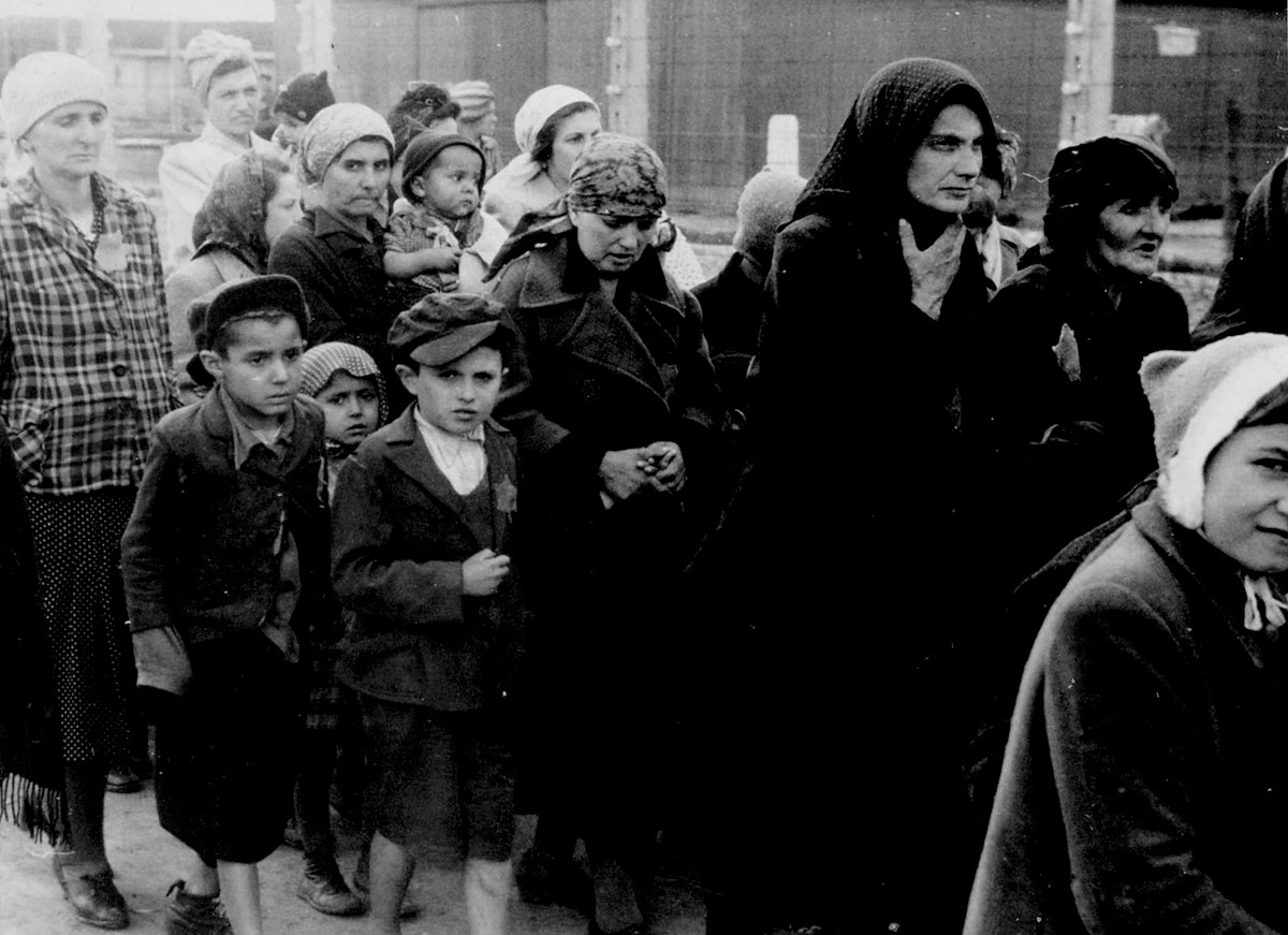 Jewish women and children forced to walk towards the gas chambers