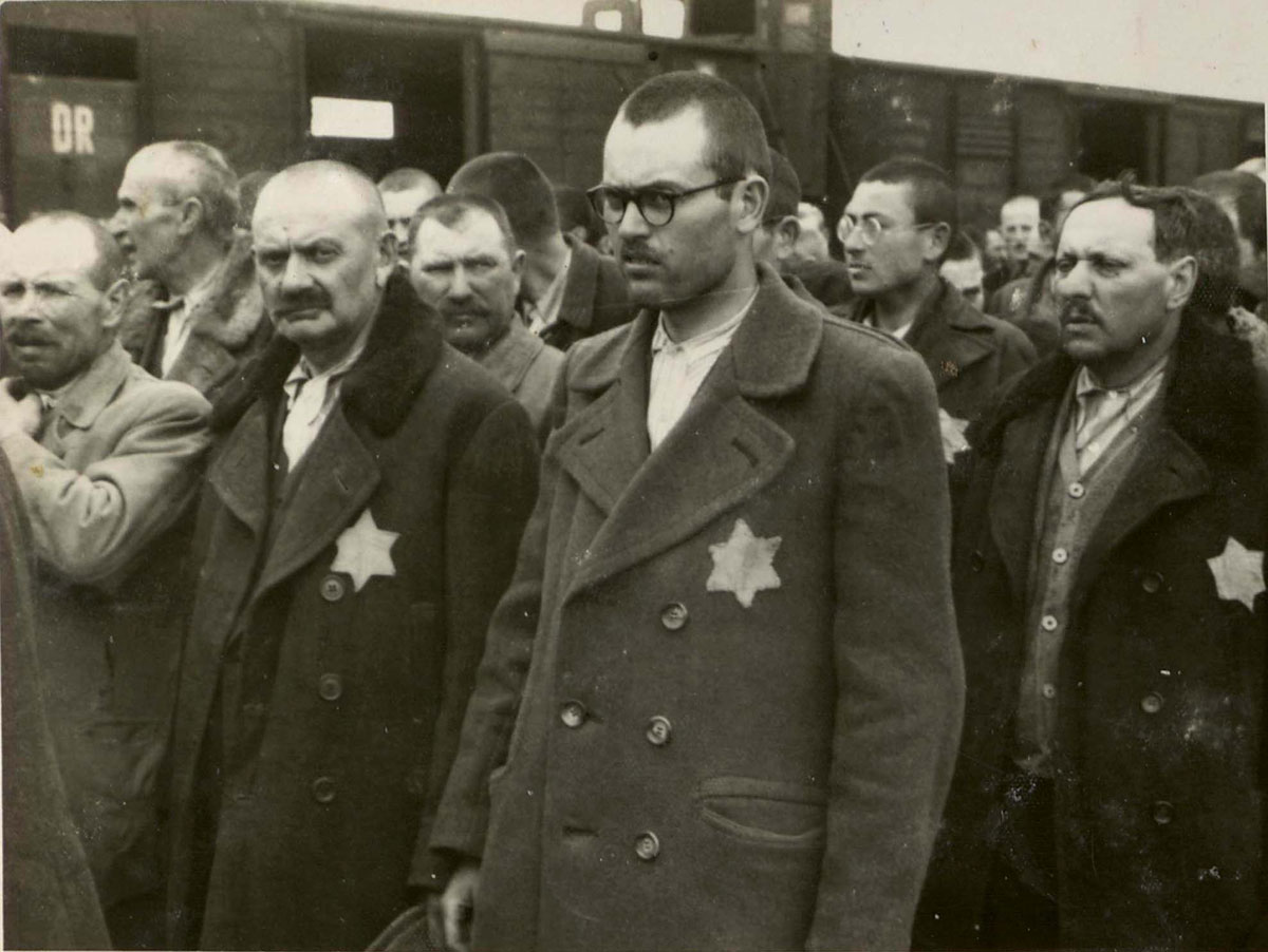 Second from left: Jacob Fettman, from Nyirjespuszta ghetto, third from left - his son, Menachem Zvi Fettman