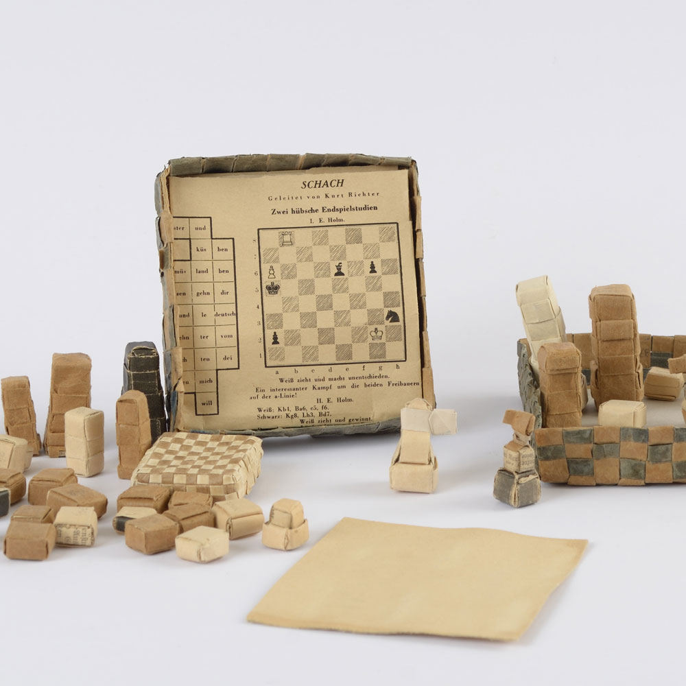 Chess set made from paper in the Buchenwald camp by political prisoner Hermann Rautenberg, a Jew from Berlin