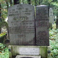 The tombstone of Leah Leser with the plaque commemorating the Gebuertig family, The new Jewish cemetery, Cracow