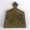 Misu Wolf’s signature engraved on the pendant he crafted for Sali Buium