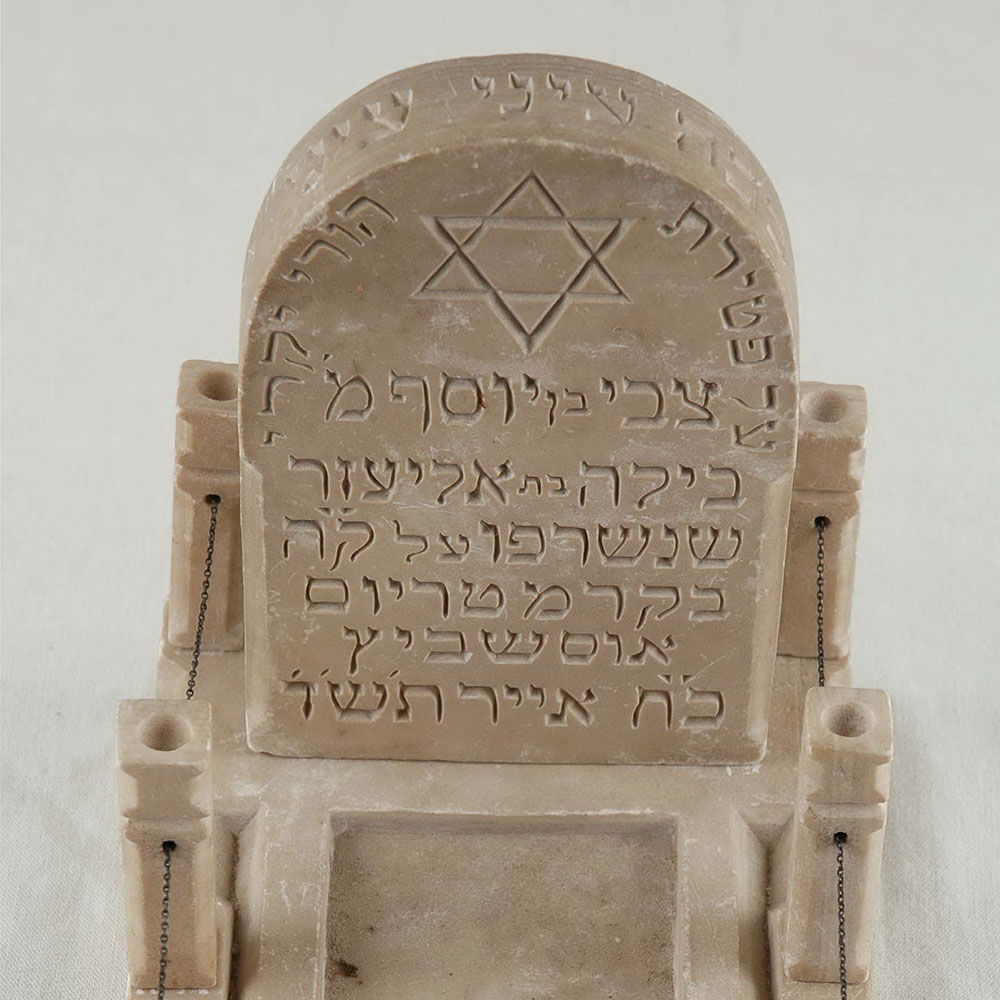 Miniature tombstone made by Katriel Wertzberger in a detainment camp in Cyprus in memory of his murdered parents