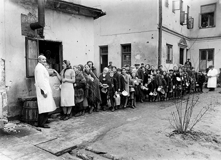Warsaw, Poland, People lined up at a public kitchen in the ghetto