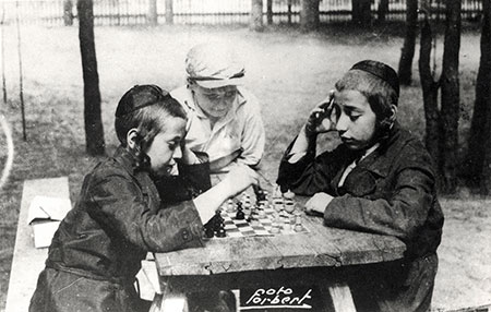 Długosiodło, Poland, 1930, Religious boys playing chess at a summer camp