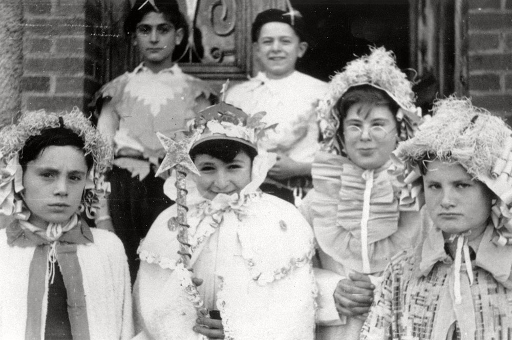 Jewish refugee children in the Chabannes children's home dressed in Purim costumes, March 1942. Pictured: Michel Razymovsky, Georges Sztrum, Arnaud Marcouse,  Georges Jacob and Norbert Bikales