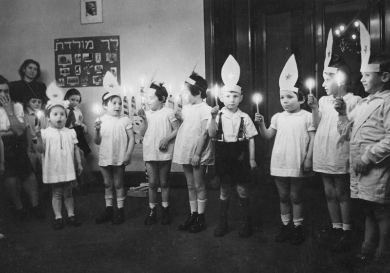 Children celebrating the festival of Chanukah at the children's home in Blankenese, Hamburg, Germany.  December 1947