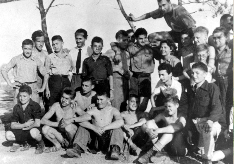 "Buchenwald boys" with Simone Chaumet at the children's home in Écouis, France, summer 1945