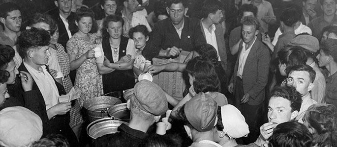 Distribution of Passover rations, in Czechoslovakia, to Holocaust survivors along the route of the Bricha