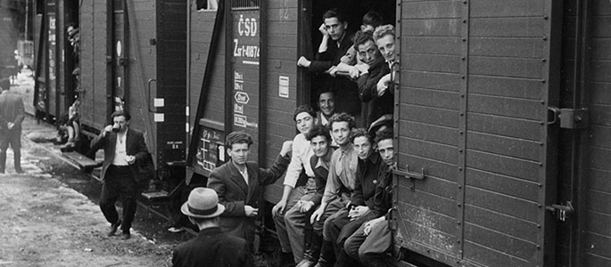Youngsters waiting for a train bound for Western Europe, Bratislava, 1946