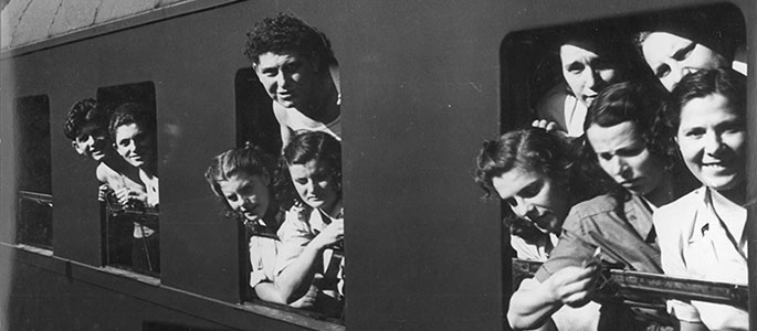 Youngsters waiting for a train bound for Western Europe, Bratislava, 1946