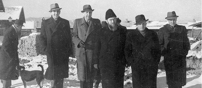 Members of the Jewish Committee in the Nováky forced labor camp, together with one of the rabbis from the Working Group