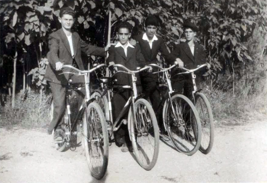 Four young Jewish men riding bicycles, Monastir, prewar