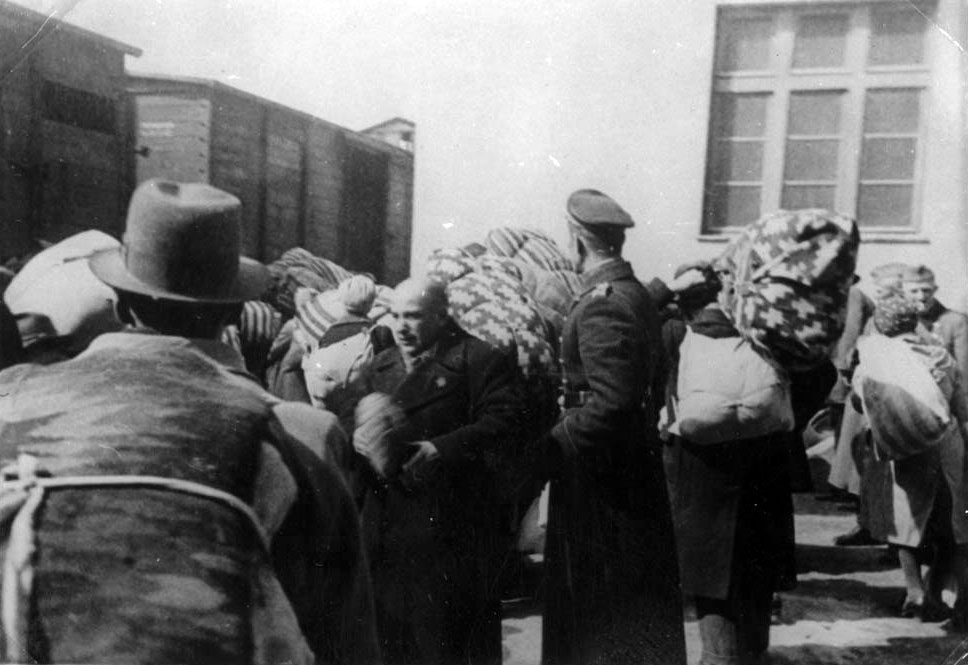 Jews board trains bound for Treblinka, Skopje, March 1943