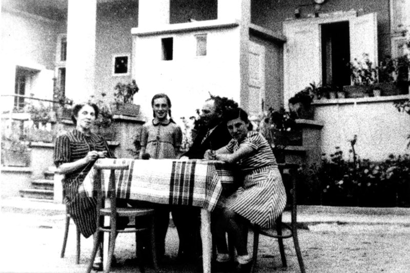 The Aron family in their garden in Munkács, 1939-1940: parents Sidi and Ference and daughters Olga (right) and Marta. The girls survived, immigrated to Israel and settled in Netanya.