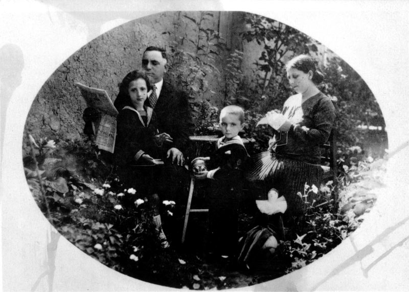The Hoyzman family in their garden in Munkács, 1930s: parents Roszi and Soma , daughter Anci, son Zvi-Imre (Imi). Roszi, Soma and Anci were murdered in the Holocaust. Zvi-Imre came to Eretz Israel and was killed in an Etzel operation in 1948.