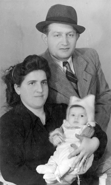 Adolf Mermelstein of Munkács with his second wife and their daughter Malka, 1947