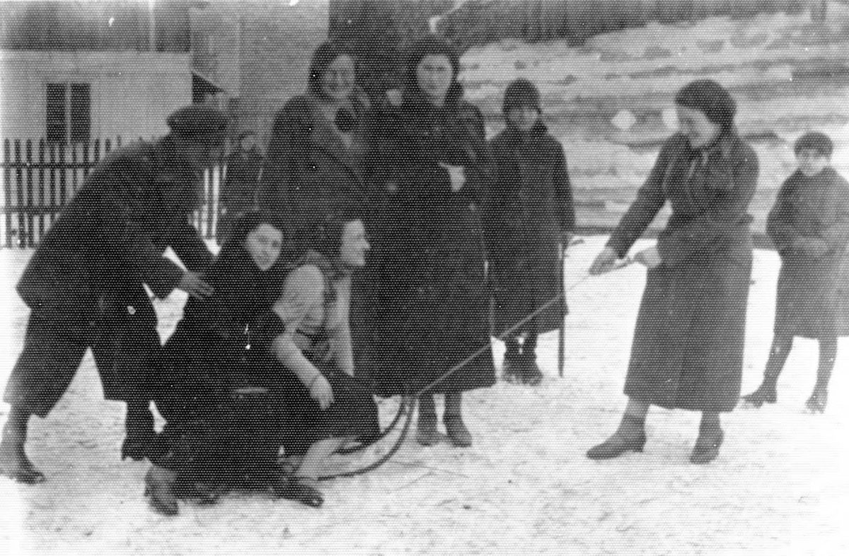 Trzebinia, 1930 – Jewish youths playing with a sled in the snow
