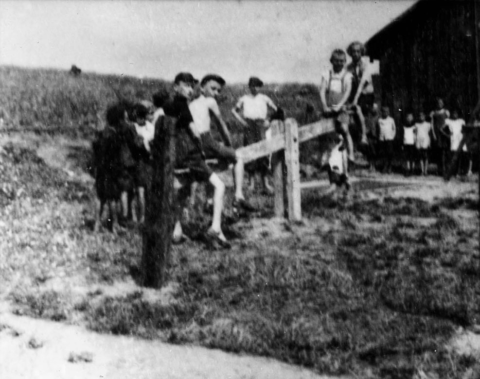 Trzebinia, 1941 – Children by a synagogue used as a kindergarten during the war. The building was still in existence in 2002
