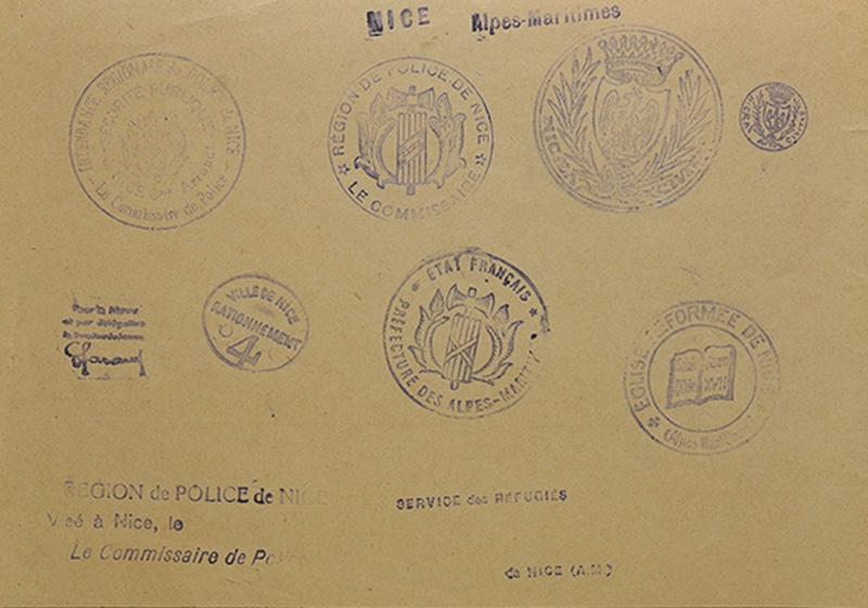 Pages with stamps from different places in France