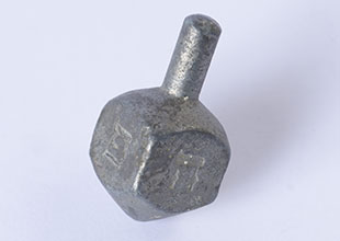 The dreidel that was cast for Ester Veisfeiller by one of her teachers in Kezmarok in 1942
