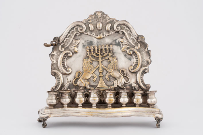This is one of many Hanukkah menorahs that was plundered by the Nazis.  The menorahs, along with other Judaica, was collected by the Jewish Cultural Reconstruction Organization after the war