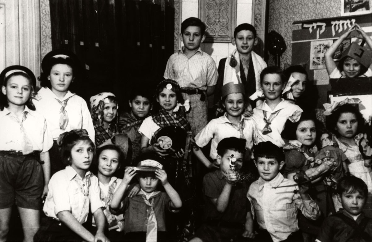 Lodz, Poland, 1948, A Hanukkah celebration at the Coordination Committee Orphanage. All the children in the orphanage had been hidden by non-Jewish families during the war