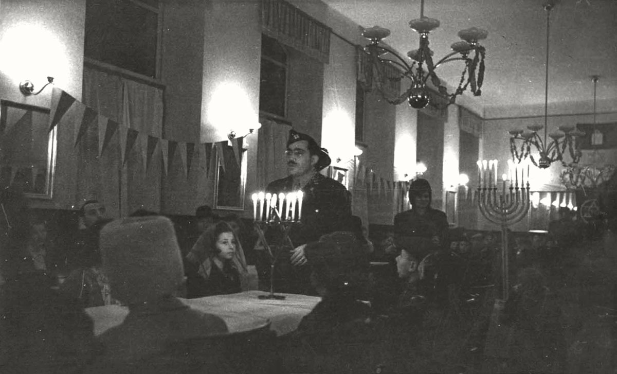Austria, 1947, Lighting of Hanukkah candles in a DP camp