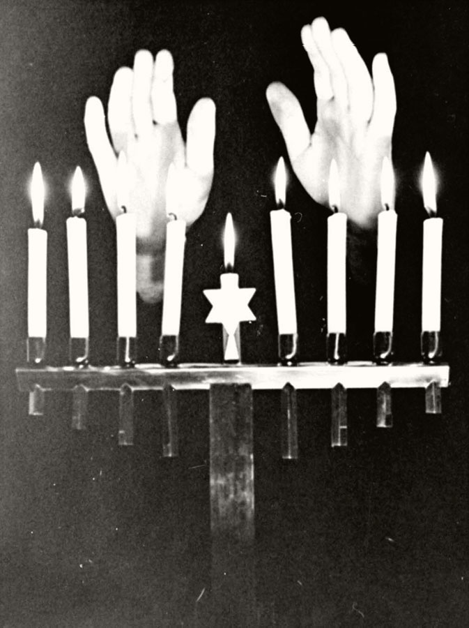 Berlin, Germany, 1930s, a lit Hanukkah candelabrum on Hanukkah