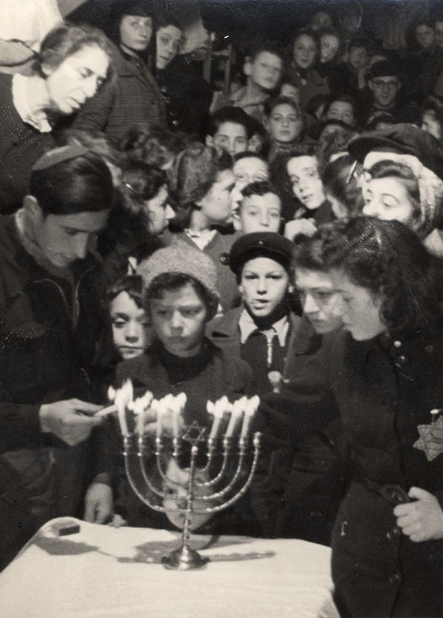 Westerbork, Holland, Candle lighting on the seventh night of Hanukkah