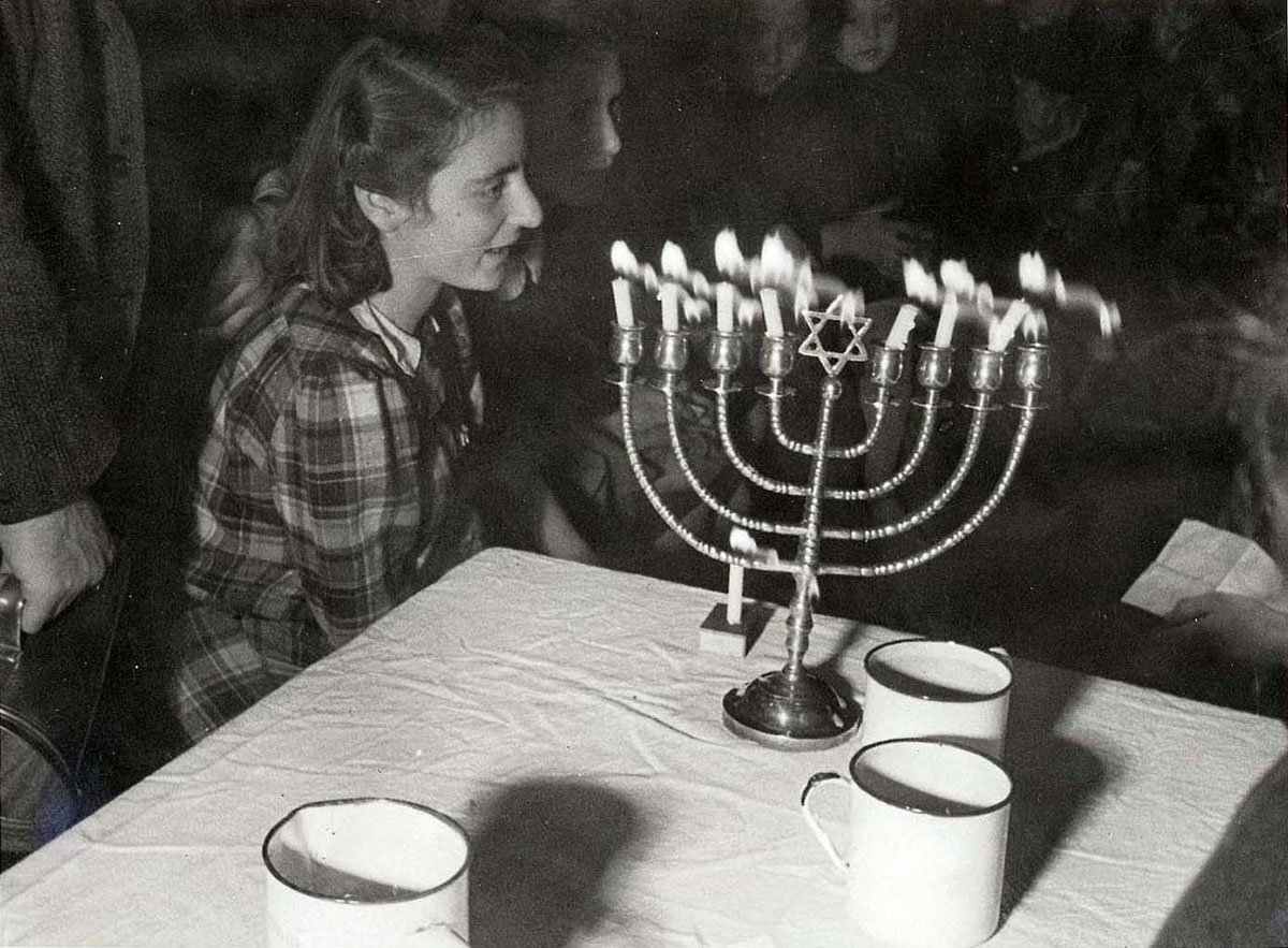 Westerbork, Holland, Lighting the candles on the seventh night of Hanukkah