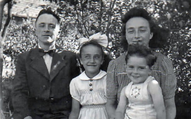 The infant Jacques Liwerant with his rescuers, Edouard and Charlotte Gibert, and their daughter Lily. Le Chambon-sur-Lignon, 1943