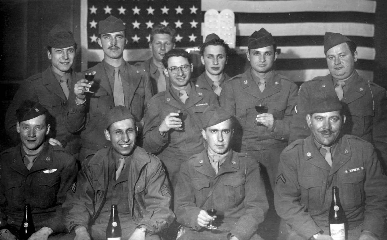 Jewish American soldiers at the first Passover Seder after liberation, Fuerstenfeldbruck DP camp, Germany, 1946