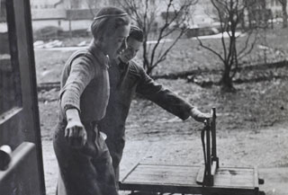 Bruno and a friend with a cart used to bring milk from the village to the children’s home, Tavannes, 1943