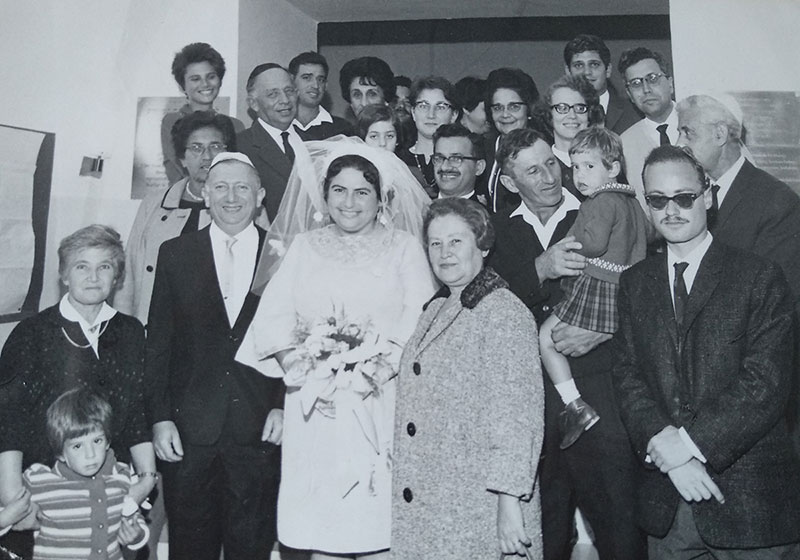 Photograph from the wedding of Shoshana Aufrecht and Chaim Isaac Landoy (wearing white yarmulke), 14 October 1967, Jerusalem